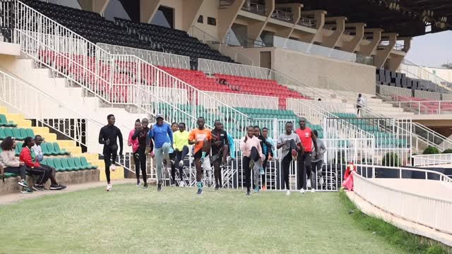 Para athletes training at a stadium